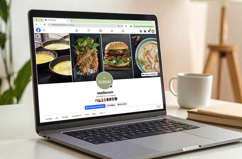 En mac som har bilde av Facebook-siden til Matbørsen på skjermen.
